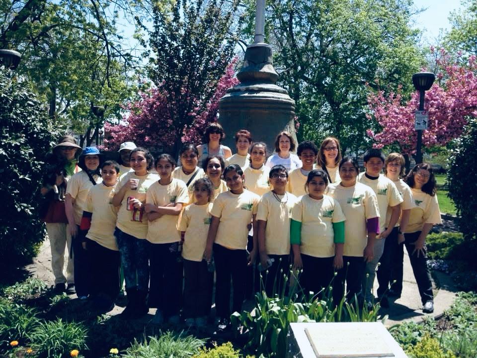 Garden volunteers planting flowers